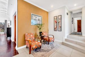 Amoris Guesthouse Randburg II - Darrenwood的休息区