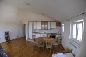 Kuchyň nebo kuchyňský kout v ubytování Apartments Trogir