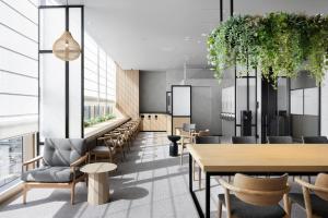a rendering of a restaurant with tables and chairs at Hotel Hankyu GRAN RESPIRE OSAKA in Osaka