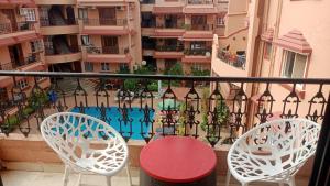 A balcony or terrace at Kyle Calangute 1 bhk luxury apartment with pool