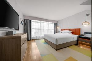 Voodi või voodid majutusasutuse Home2 Suite by Hilton Chongqing South Bank toas