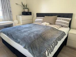 Postel nebo postele na pokoji v ubytování Just Like Home Bed & Spa Porsgrunn
