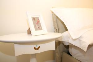 Postel nebo postele na pokoji v ubytování Anthos Casa Vacanze