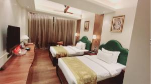 A bed or beds in a room at The Mantis