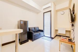 Μια τηλεόραση ή/και κέντρο ψυχαγωγίας στο Cozy and Simply Look 2BR 19 Avenue Apartment By Travelio