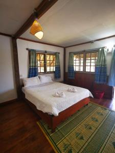 Katil atau katil-katil dalam bilik di Sipasert Guesthouse-Tadlo