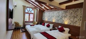Letto o letti in una camera di Lazimpat Boutique Hotel