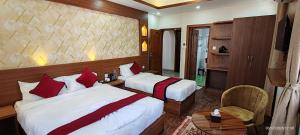 Letto o letti in una camera di Lazimpat Boutique Hotel
