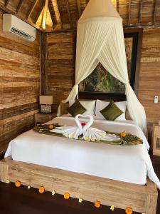 Postel nebo postele na pokoji v ubytování Aura Guesthouse