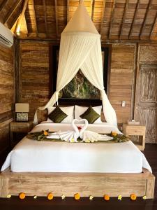 Postel nebo postele na pokoji v ubytování Aura Guesthouse