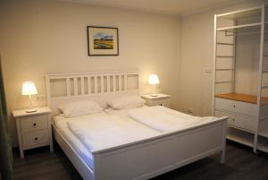 Postel nebo postele na pokoji v ubytování Hotel & Café Göller