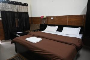 Postel nebo postele na pokoji v ubytování Daaruka vane eco resort