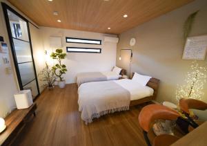 Giường trong phòng chung tại RGH ISHIUCHI BASE - Vacation STAY 15899
