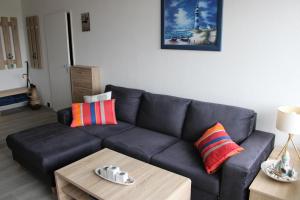Posezení v ubytování Ferienwohnung L432 für 2-4 Personen an der Ostsee
