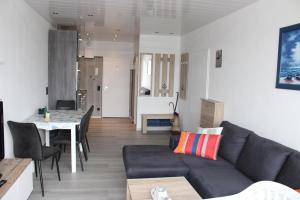 Posezení v ubytování Ferienwohnung L432 für 2-4 Personen an der Ostsee