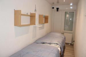 Postel nebo postele na pokoji v ubytování Ferienwohnung L432 für 2-4 Personen an der Ostsee
