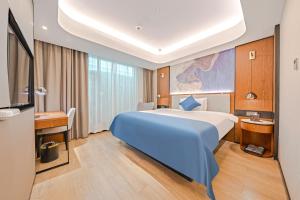 Katil atau katil-katil dalam bilik di Yunfei Hotel - Shanghai Hongqiao Wuzhong Road Branch