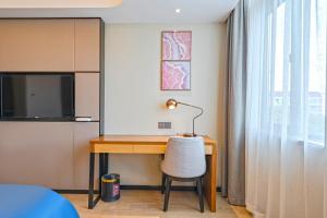 Televisyen dan/atau pusat hiburan di Yunfei Hotel - Shanghai Hongqiao Wuzhong Road Branch