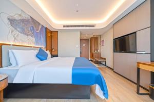 Katil atau katil-katil dalam bilik di Yunfei Hotel - Shanghai Hongqiao Wuzhong Road Branch
