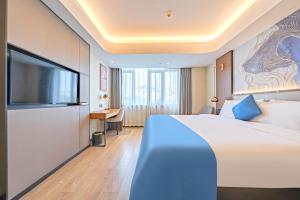 TV a/nebo společenská místnost v ubytování Yunfei Hotel - Shanghai Hongqiao Wuzhong Road Branch