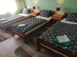 Una cama o camas en una habitación de Kuća Jovanka
