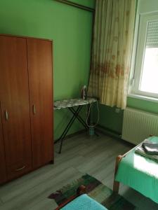Una cama o camas en una habitación de Kuća Jovanka
