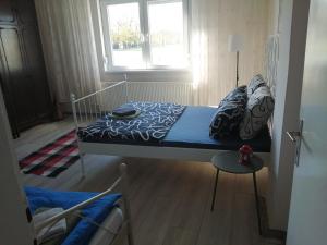 Una cama o camas en una habitación de Kuća Jovanka