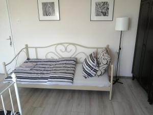 Una cama o camas en una habitación de Kuća Jovanka