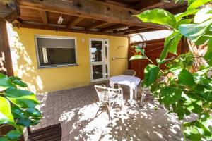 Patio alebo iná vonkajšia časť ubytovania Attico Bella Vista