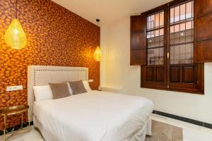 Giường trong phòng chung tại Argo7e Olehousing