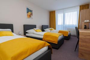 Rúm í herbergi á Hotel FIT