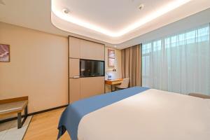 Televisyen dan/atau pusat hiburan di Yunfei Hotel - Shanghai Hongqiao Wuzhong Road Branch
