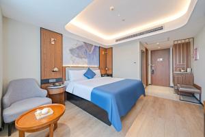 Katil atau katil-katil dalam bilik di Yunfei Hotel - Shanghai Hongqiao Wuzhong Road Branch