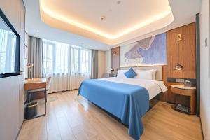 Katil atau katil-katil dalam bilik di Yunfei Hotel - Shanghai Hongqiao Wuzhong Road Branch