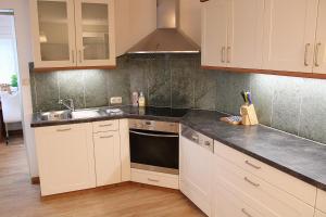 Η κουζίνα ή μικρή κουζίνα στο Haus Heidi Top 6 by Alpenfeder