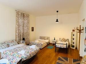 Postel nebo postele na pokoji v ubytování TURATI ROOMs
