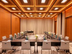 a large conference room with a long table and chairs at Raffles Europejski Warsaw in Warsaw +37 photos