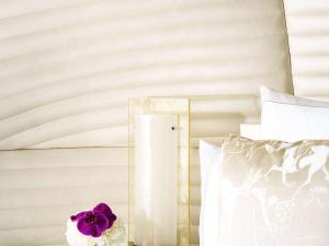 Vuode tai vuoteita majoituspaikassa Fairmont Doha