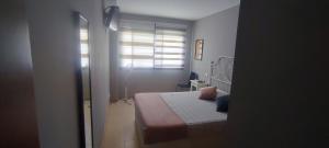 En eller flere senge i et værelse på La Casina de Retamar