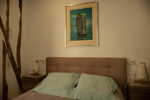 Postel nebo postele na pokoji v ubytování Le Libération