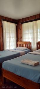 Postel nebo postele na pokoji v ubytování Saint Joseph Inn