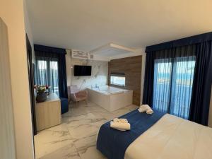 Voodi või voodid majutusasutuse Hotel Cocceio toas