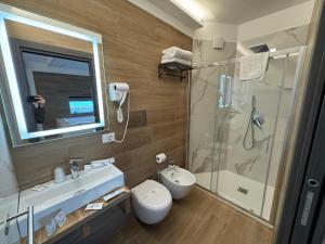 Vannituba majutusasutuses Hotel Cocceio