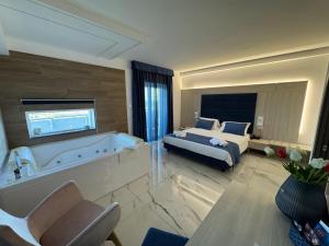 Voodi või voodid majutusasutuse Hotel Cocceio toas