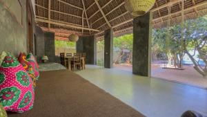 Κήπος έξω από το Bila Beach House