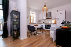 Kuchyň nebo kuchyňský kout v ubytování Apartment 2 Weide Zanthierhaus