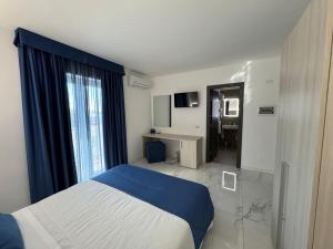 Voodi või voodid majutusasutuse Hotel Cocceio toas