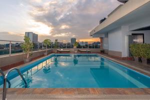 a swimming pool on the roof of a building at Highlands Suites Hotel Apartments in Nairobi