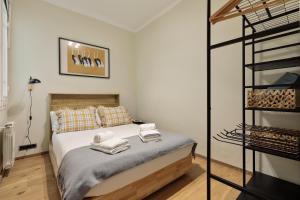 Posteľ alebo postele v izbe v ubytovaní Enjoy Apartments Donna