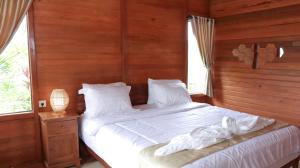 Postel nebo postele na pokoji v ubytování Nora Cottage